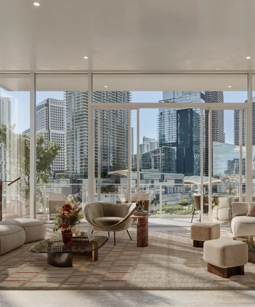 Rendering of a living room with floor-to-ceiling windows and Miami River views